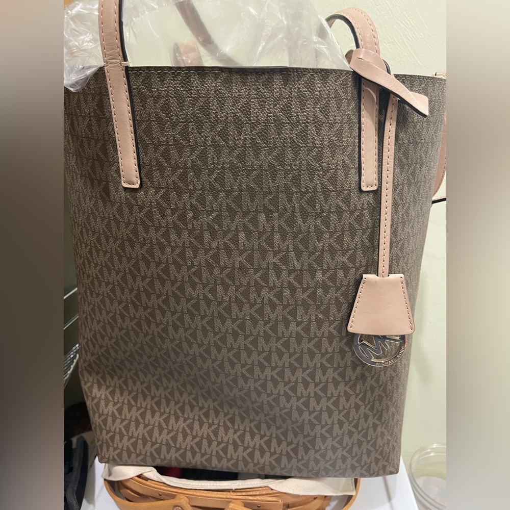 Excellent condition, Michael Kors Brown And Tan Leather Jet Set Tote